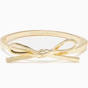 Gold skinny bow Kate Spade bracelet